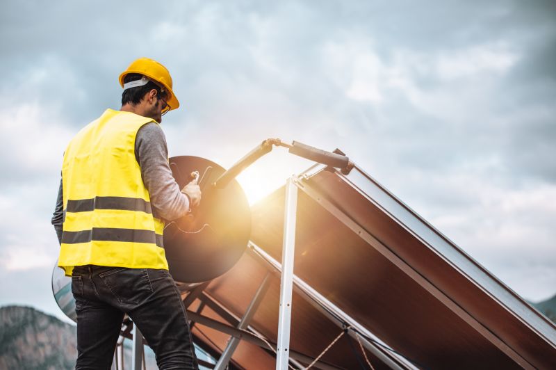 Maintenance Technician Inspecting Panels